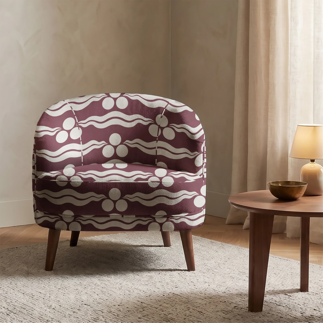 Chintamani Tiger in blackcurrant and travertine: triple-disc chintamani roundels above paired wave bands, translated from a 15th-century Bursa silk velvet at The Metropolitan Museum of Art. cohort1 vb chair