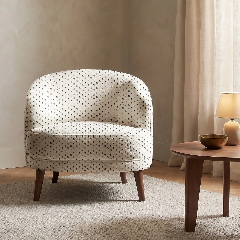 Near-black blue Second Empire tulip silhouette on an ivory ground: chenille armchair upholstery mockup.