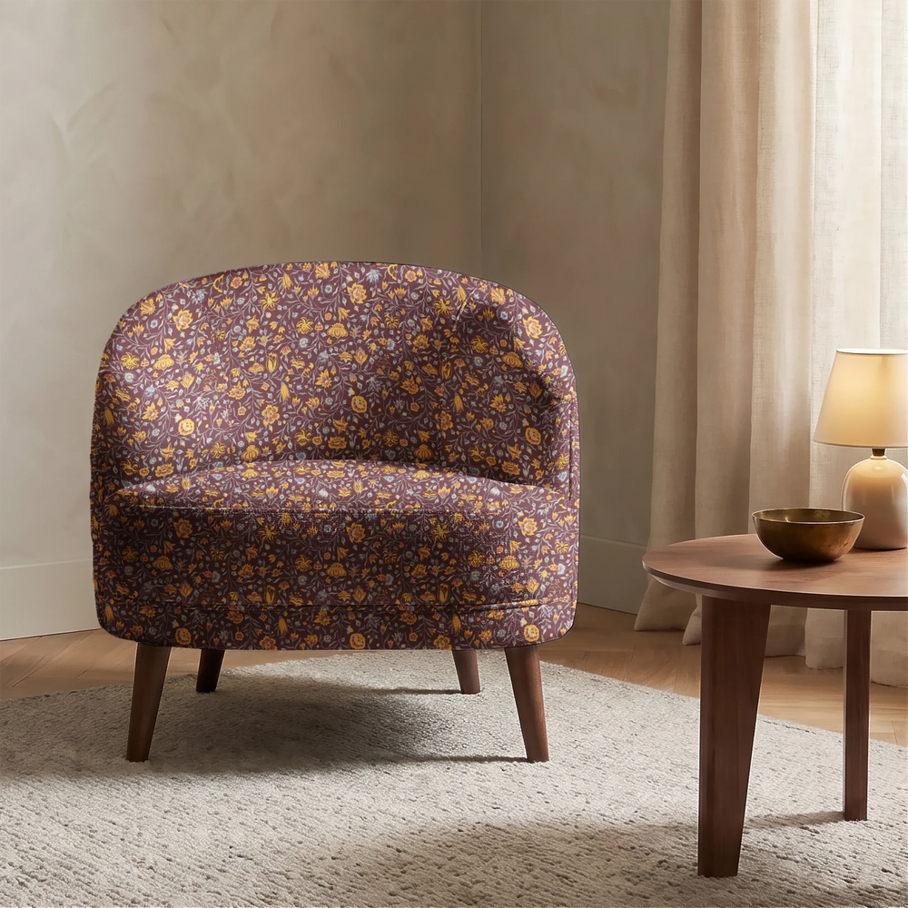 Yellow 18th century Indian chintz vine on a dark purple ground: chenille armchair upholstery mockup.