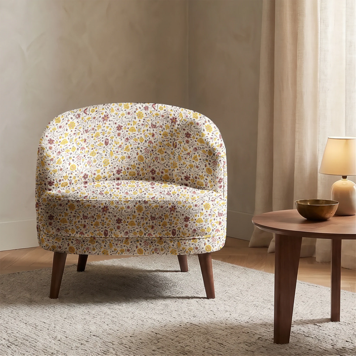 Yellow 18th century Indian chintz vine on a white ground: chenille armchair upholstery mockup.
