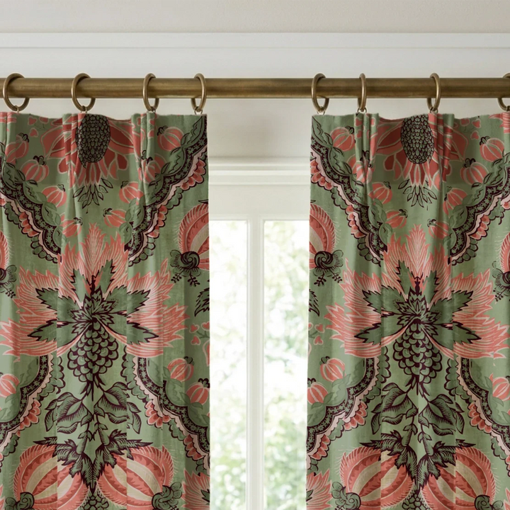 Flowering Pomegranate in eucalyptus and terracotta: an ogee lattice of lace borders framing a blossom held between two swelling pomegranates, translated from an 18th-century French block-printed quilt. cohort1 vb curtains