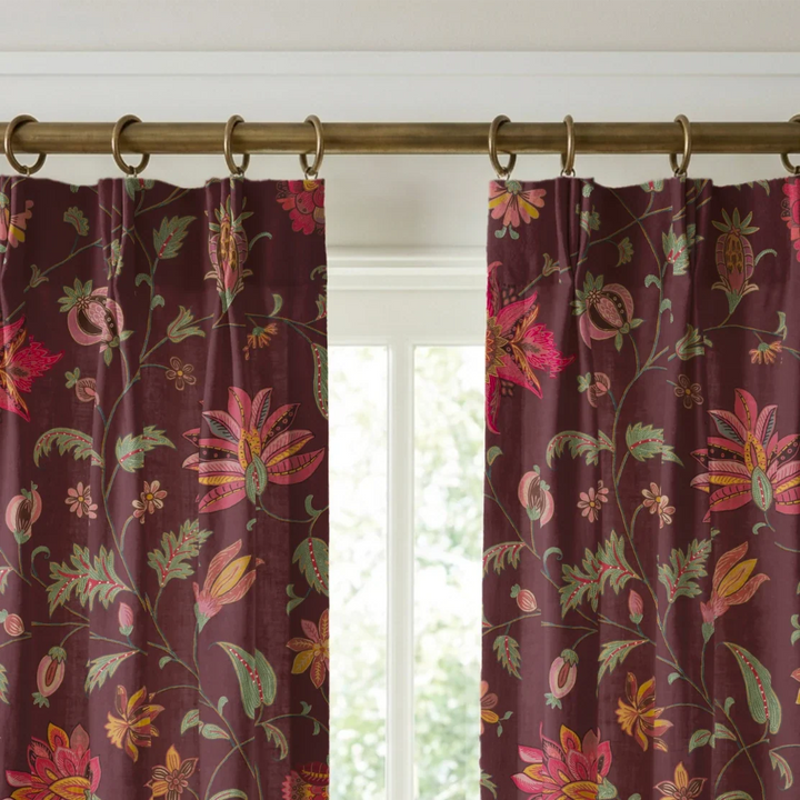 Red and gold florals on a dark purple ground linen cotton window curtains mockup.