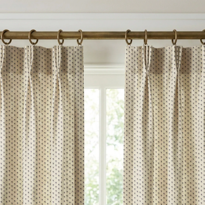 Near-black blue Second Empire tulip silhouette on an ivory ground: linen cotton window curtains mockup.