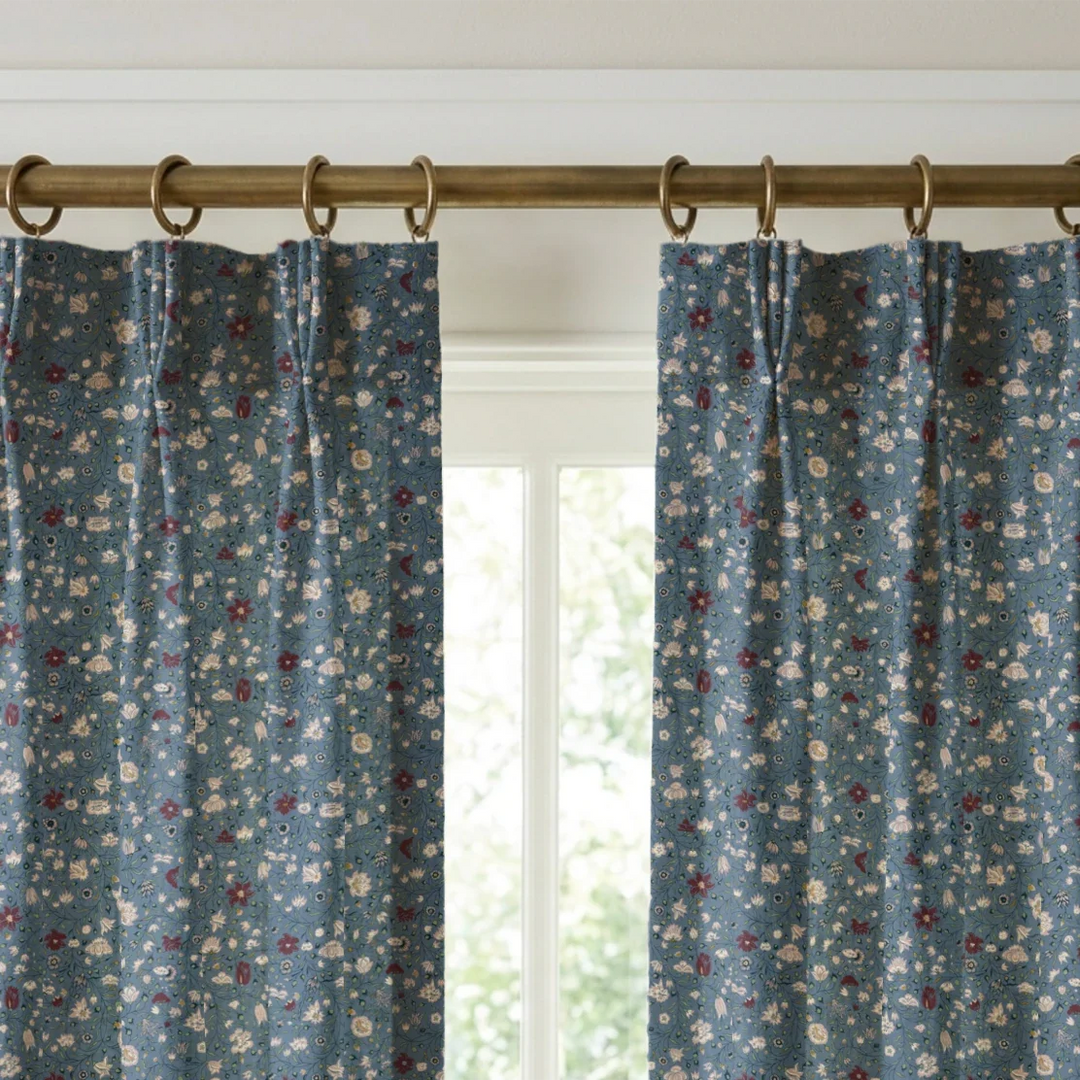 Pink 18th century Indian chintz vine on a muted blue ground: linen cotton window curtains mockup.