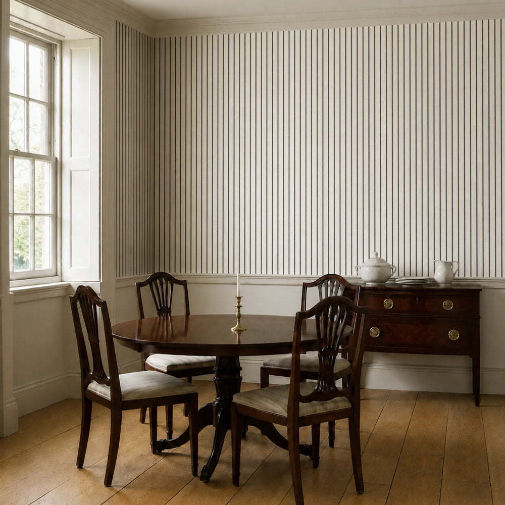 Navy woven-texture pencil stripe on a white ground: wallpaper installed in a dining room