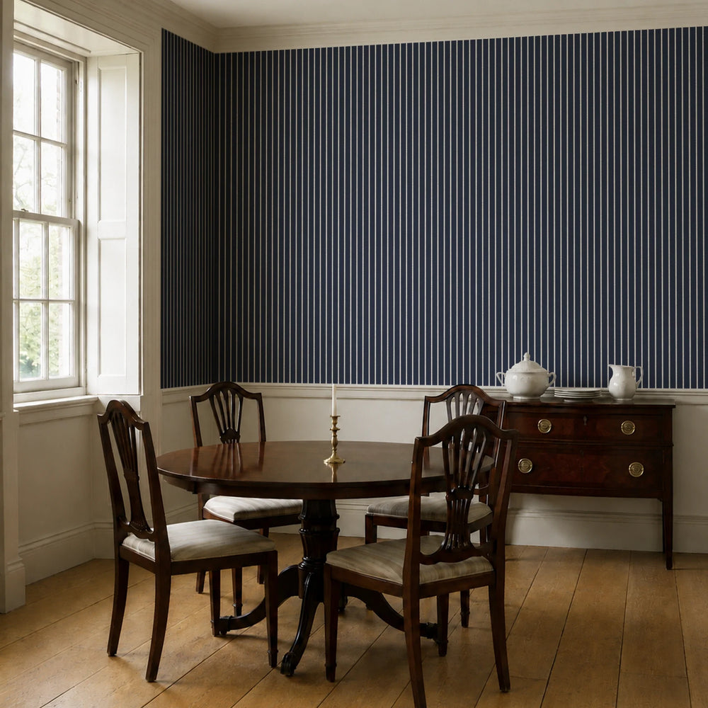 White woven-texture pencil stripe on a navy ground: wallpaper installed in a dining room