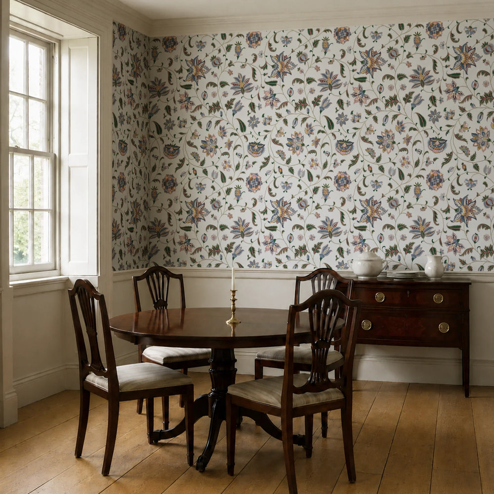 Navy floral vines on a grey ground wallpaper installed in a dining room