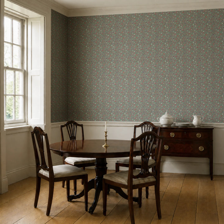 Dark purple 18th century Indian chintz vine on a grey-green ground: wallpaper installed in a dining room