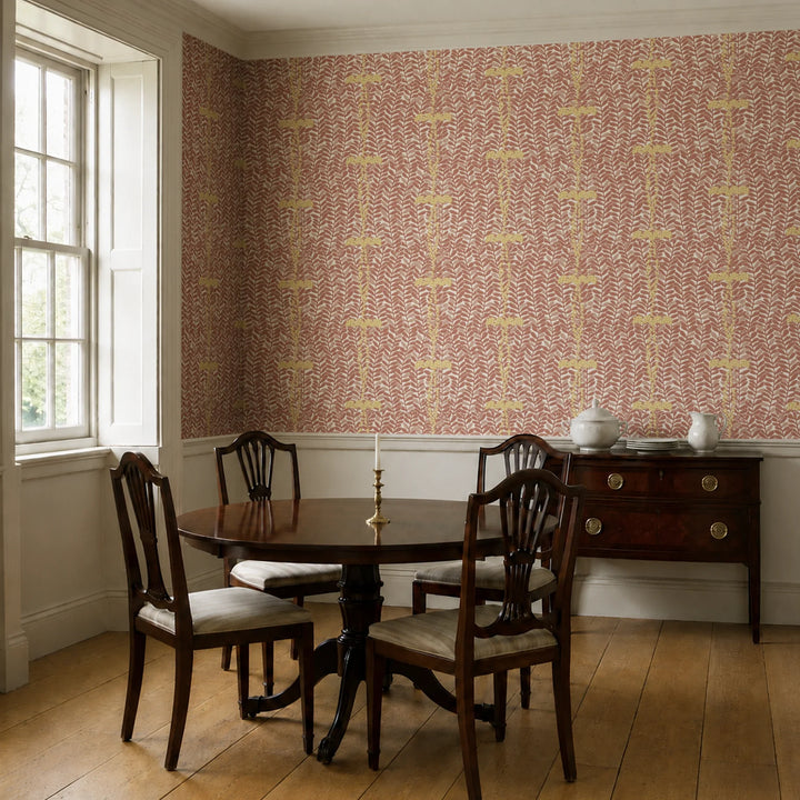 Brown 1918 leaf sprays with gold berries on a beige ground: wallpaper installed in a dining room