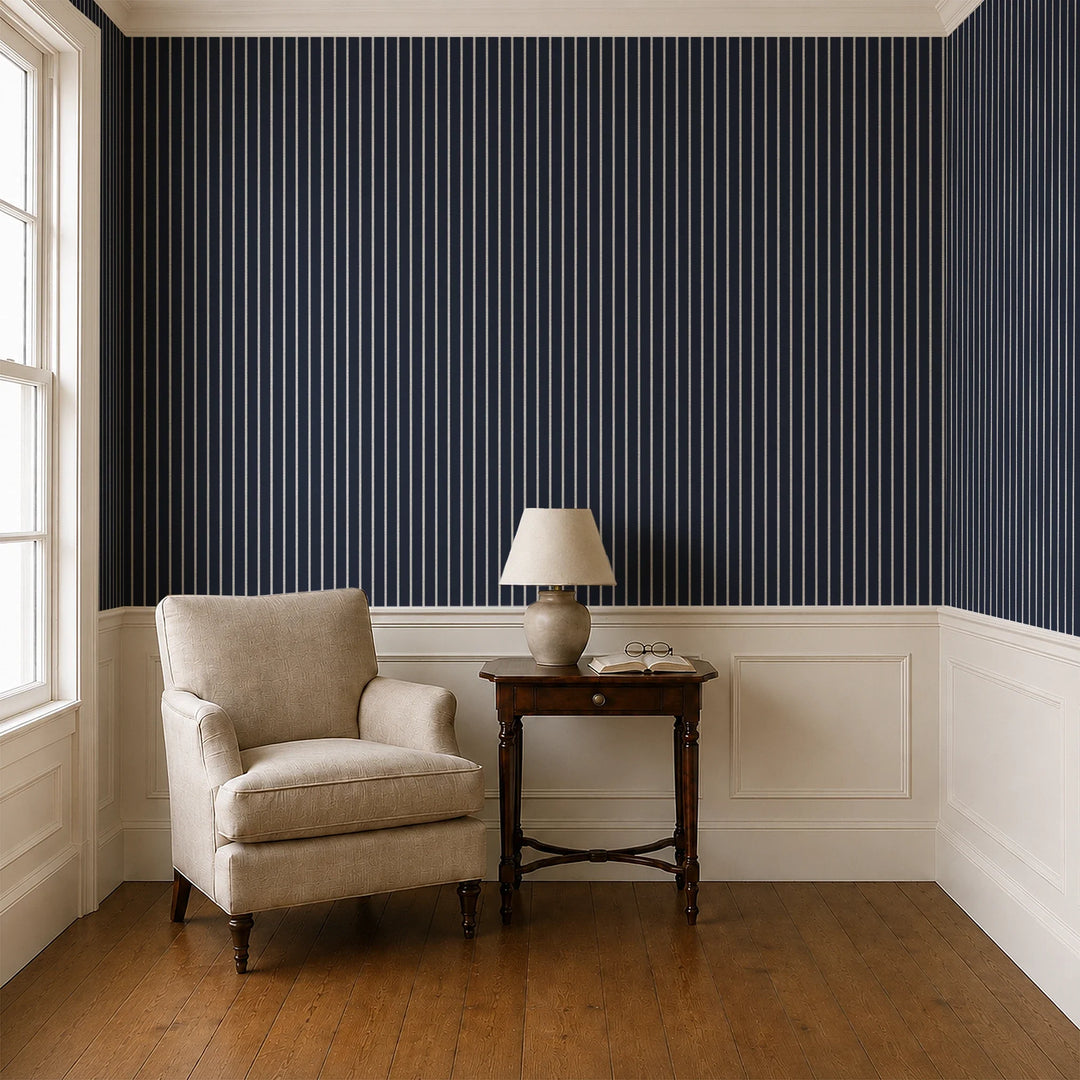 White woven-texture pencil stripe on a navy ground: wallpaper installed in a parlor with panelled dado