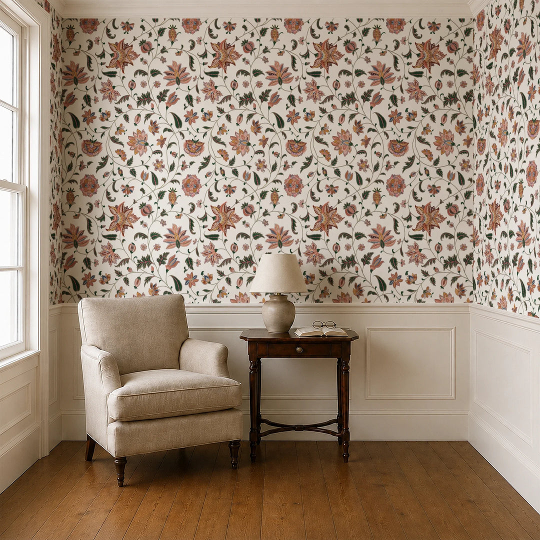 Orange and green floral vines on a white ground wallpaper installed in a parlor with panelled dado
