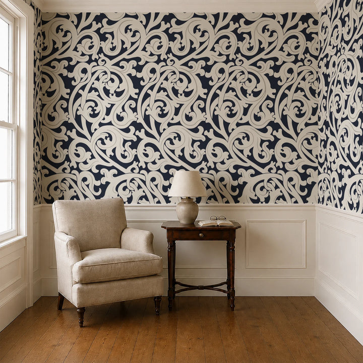 Large beige acanthus scroll motif on a navy ground: wallpaper installed in a parlor with panelled dado
