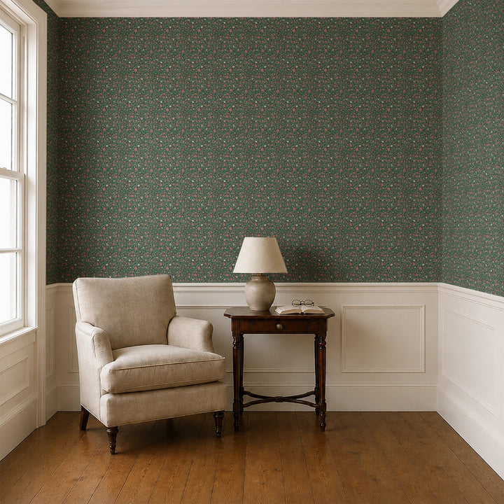 Red 18th century Indian chintz vine on a dark green ground: wallpaper installed in a parlor with panelled dado