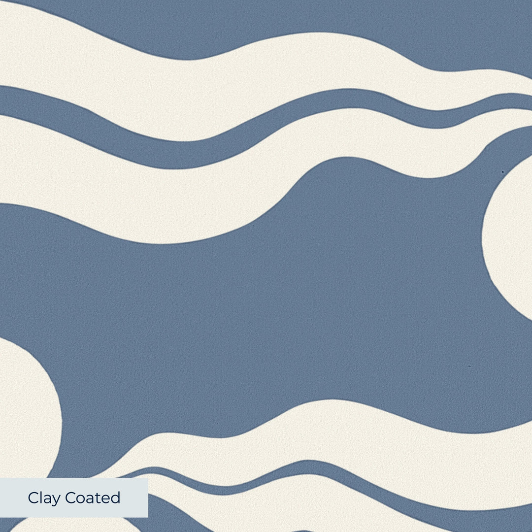 Chintamani Tiger in dusty blue and ivory: triple-disc chintamani roundels above paired wave bands, translated from a 15th-century Bursa silk velvet at The Metropolitan Museum of Art. clay-coated wallpaper closeup, smooth matte finish