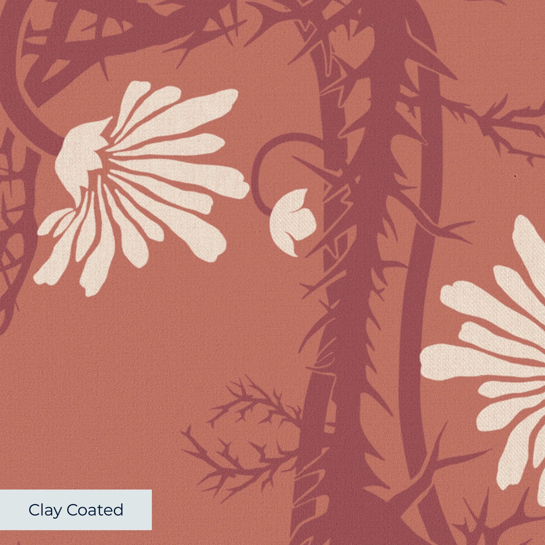 Marguerite in terracotta and pomegranate: spined, entwined stems forming vertical channels around massed daisy heads, translated from a c. 1904 Dutch linen damask finger towel by Cornelis van der Sluys. clay-coated wallpaper closeup, smooth matte finish