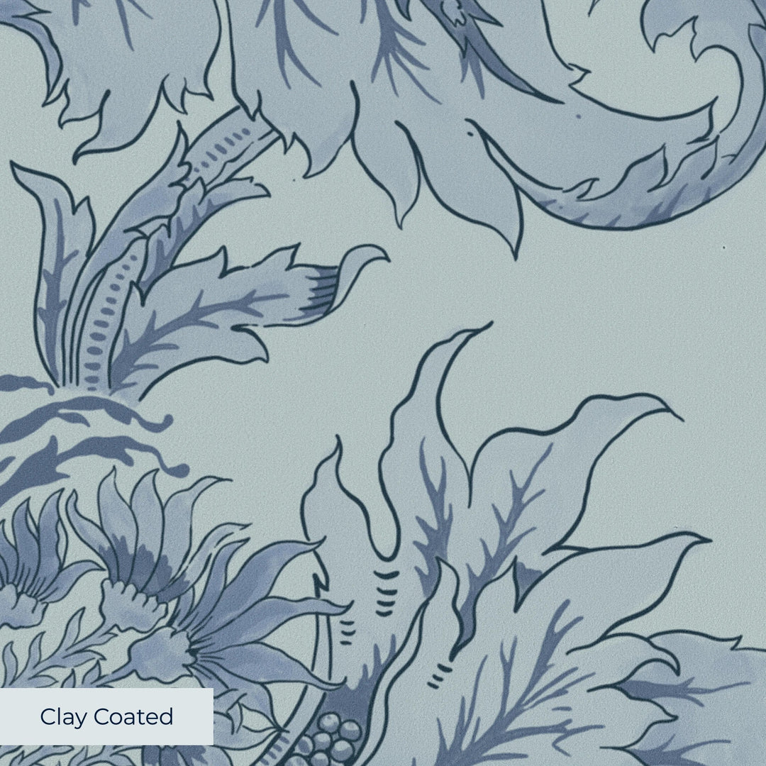 Ragged Poppy in Mist and Dusty Blue — mid-blue poppy on a soft blue-grey ground, large-scale block-printed floral repeat clay-coated wallpaper closeup, smooth matte finish
