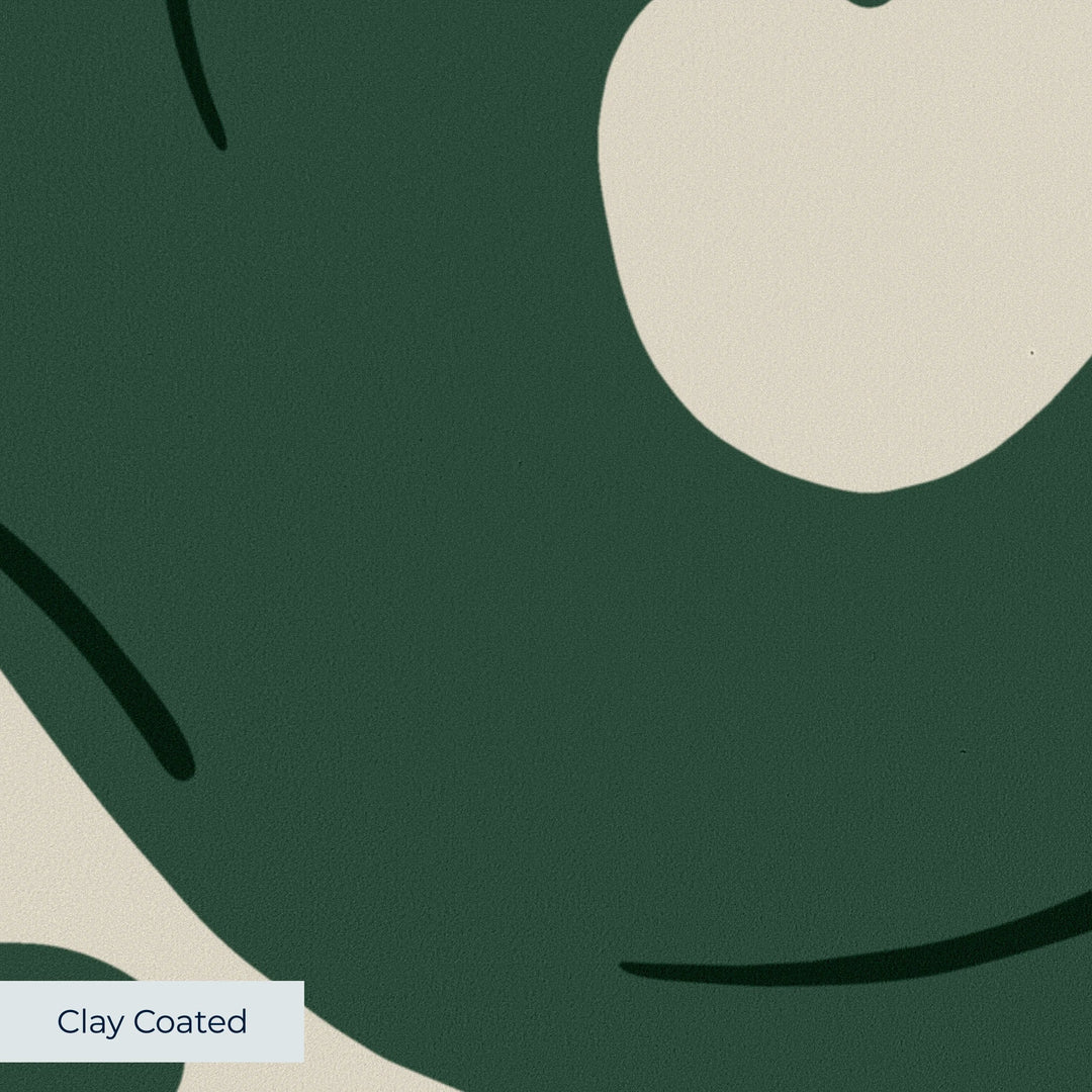 Large green acanthus scroll motif on a beige ground: clay-coated wallpaper closeup, smooth matte finish