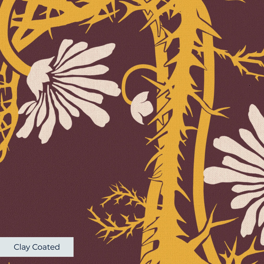 Marguerite in blackcurrant and marigold: spined, entwined stems forming vertical channels around massed daisy heads, translated from a c. 1904 Dutch linen damask finger towel by Cornelis van der Sluys. clay-coated wallpaper closeup, smooth matte finish