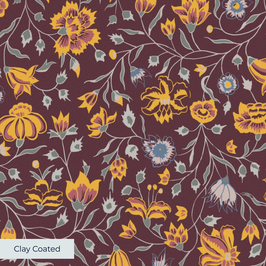 Yellow 18th century Indian chintz vine on a dark purple ground: clay-coated wallpaper closeup, smooth matte finish