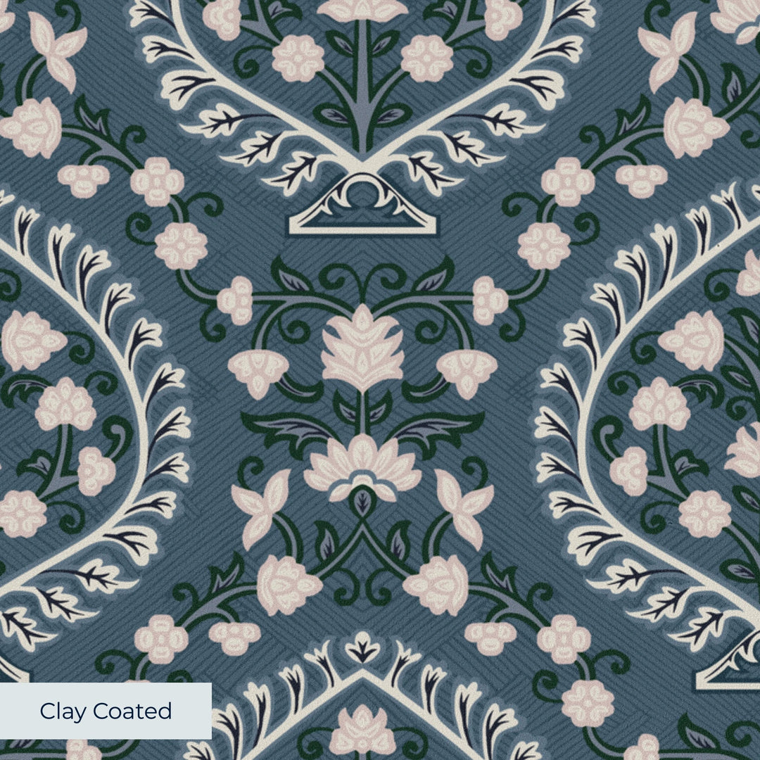 Varanasi Medallion in Slate and Linen — pale flowering plants inside pointed medallions on a cool blue-grey ground clay-coated wallpaper closeup, smooth matte finish