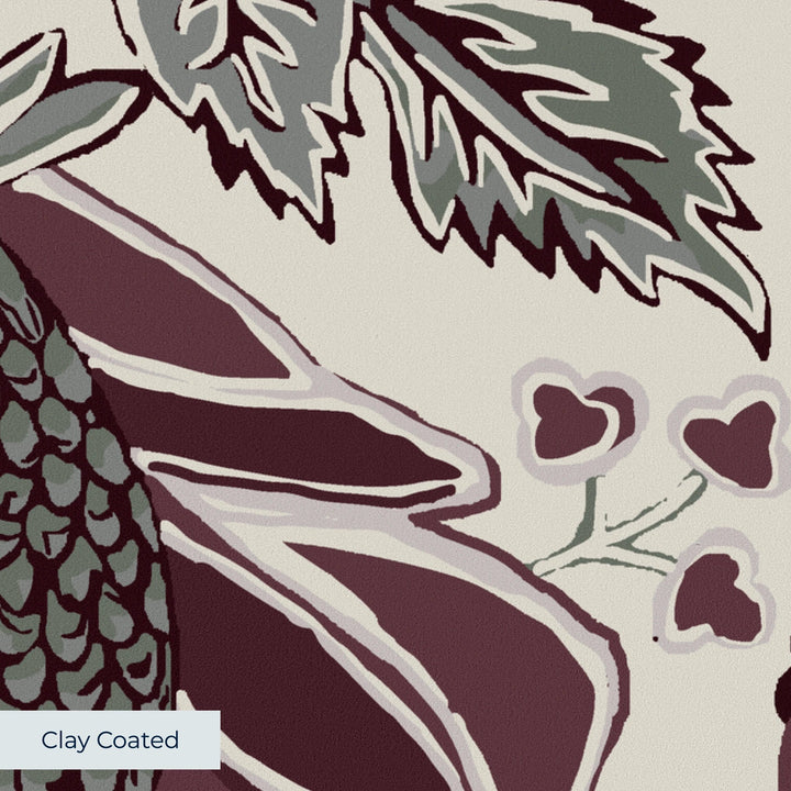 Flowering Pomegranate in linen and blackcurrant: an ogee lattice of lace borders framing a blossom held between two swelling pomegranates, translated from an 18th-century French block-printed quilt. clay-coated wallpaper closeup, smooth matte finish