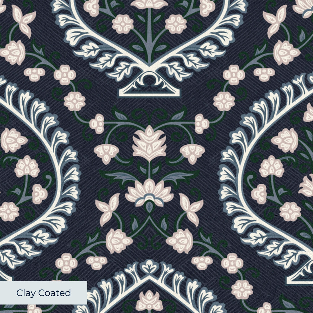 Varanasi Medallion in Indigo and Ivory — pale flowers inside pointed medallions on a near-black indigo ground clay-coated wallpaper closeup, smooth matte finish