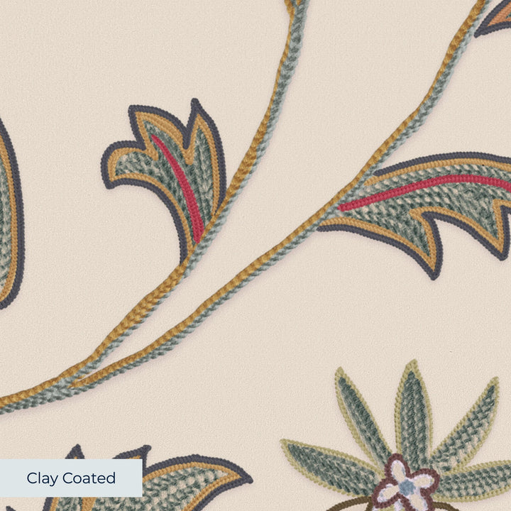 Pale pink floral vines on a grey ground clay-coated wallpaper closeup, smooth matte finish