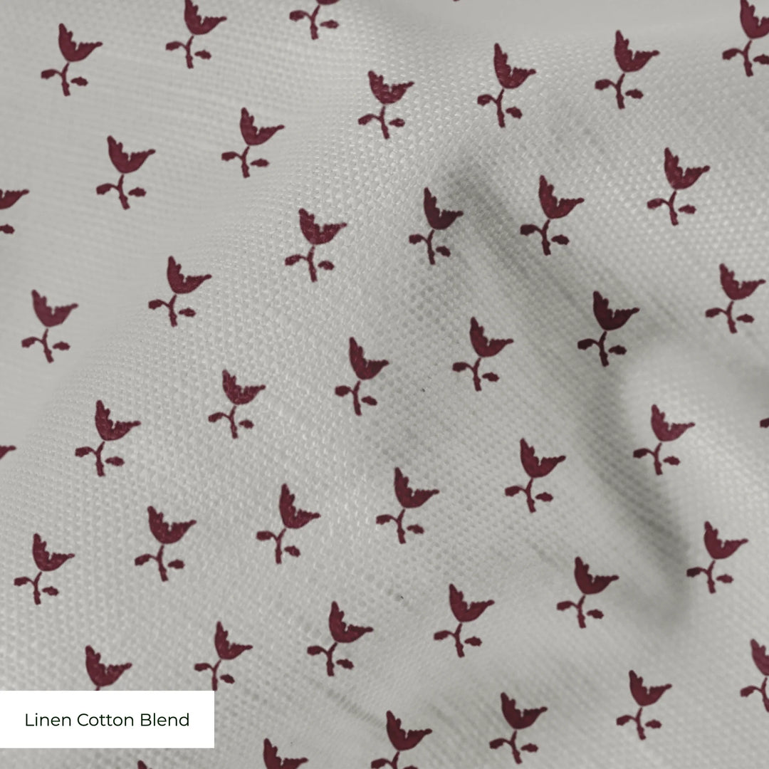 Deep red-brown Second Empire tulip silhouette on a pale grey ground: linen cotton blend swatch close-up.
