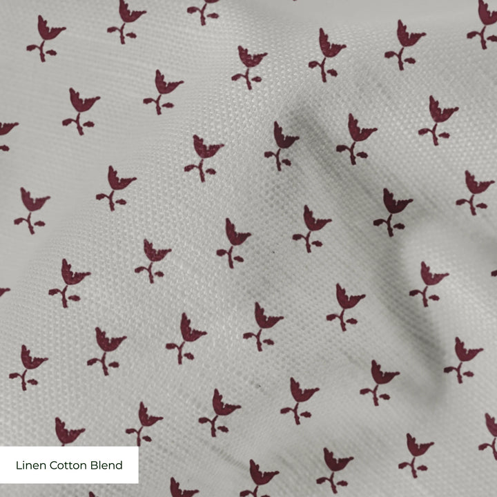 Deep red-brown Second Empire tulip silhouette on a pale grey ground: linen cotton blend swatch close-up.