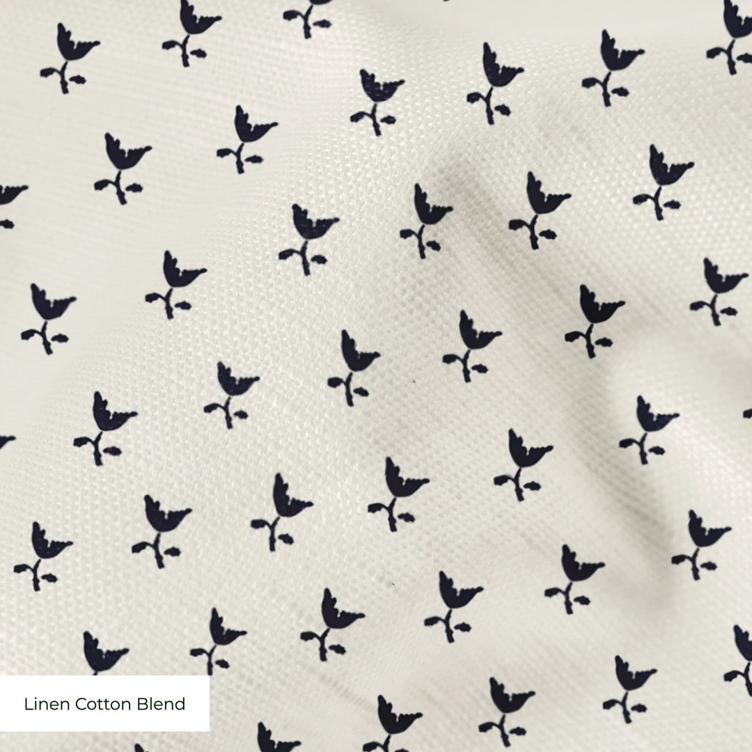 Near-black blue Second Empire tulip silhouette on an ivory ground: linen cotton blend swatch close-up.