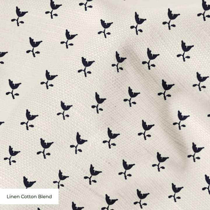 Near-black blue Second Empire tulip silhouette on an ivory ground: linen cotton blend swatch close-up.