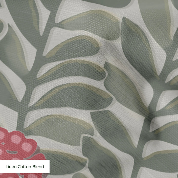 Grey-green 1918 leaf sprays with red berries on a grey ground: linen cotton blend swatch close-up.