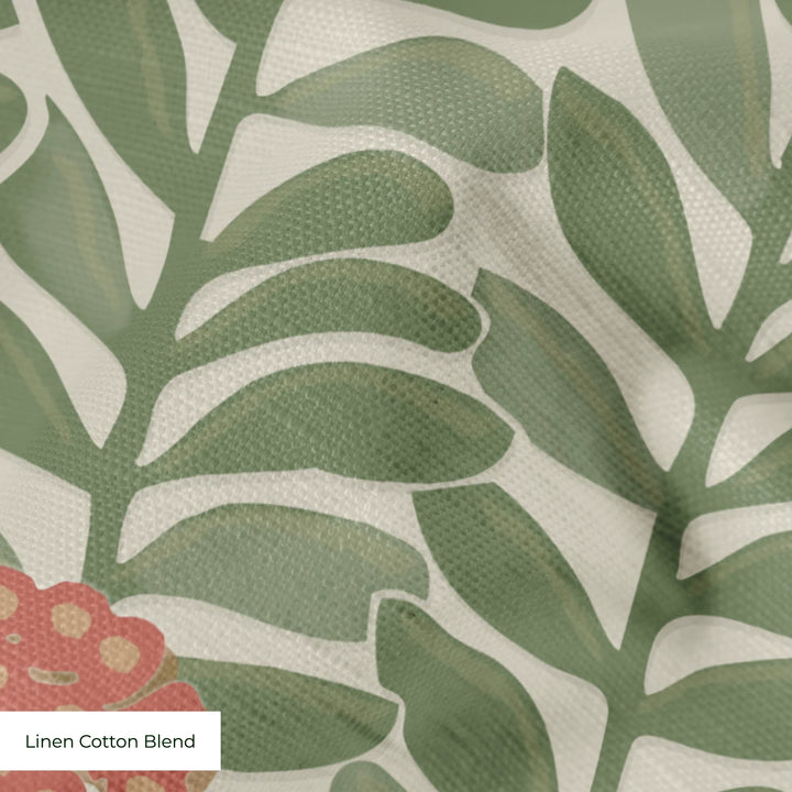 Muted green 1918 leaf sprays with red berries on a beige ground: linen cotton blend swatch close-up.