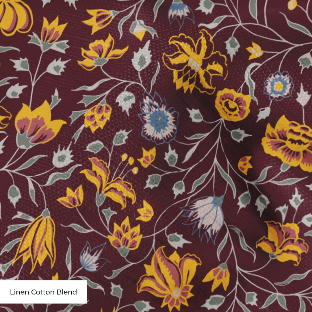 Yellow 18th century Indian chintz vine on a dark purple ground: linen cotton blend swatch close-up.