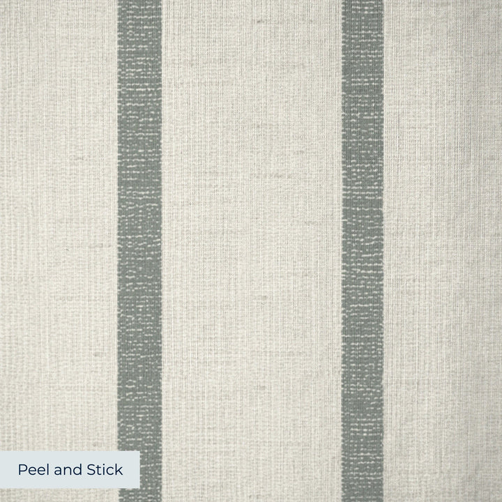 Grey-green woven-texture pencil stripe on a beige ground: peel-and-stick wallpaper closeup, linen-like texture