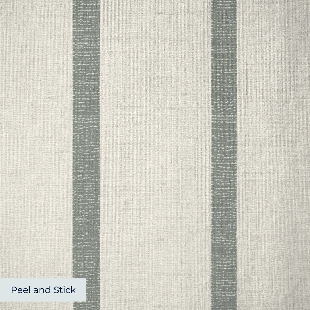 Grey-green woven-texture pencil stripe on a beige ground: peel-and-stick wallpaper closeup, linen-like texture