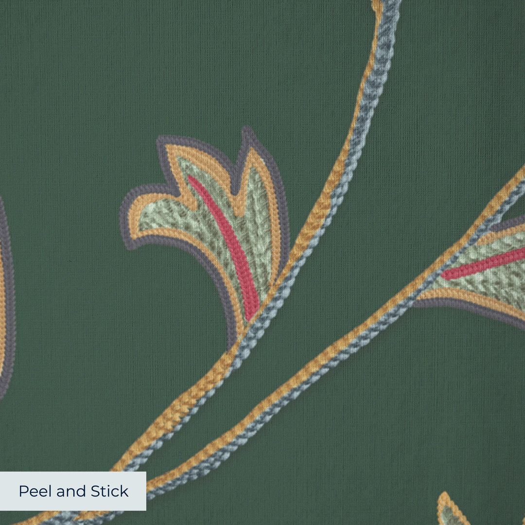 Red and gold florals on a dark green ground peel-and-stick wallpaper closeup, linen-like texture