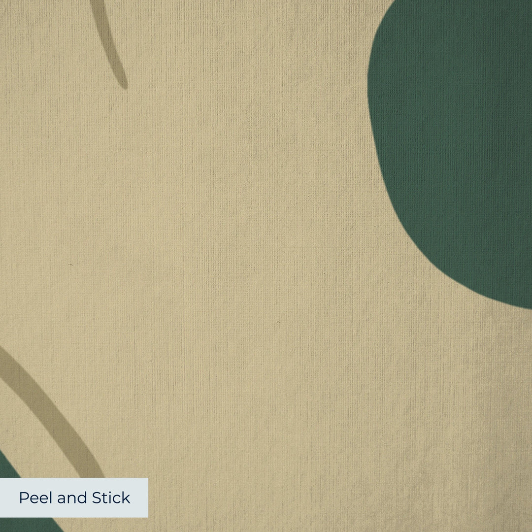 Large gold acanthus scroll motif on a green ground: peel-and-stick wallpaper closeup, linen-like texture