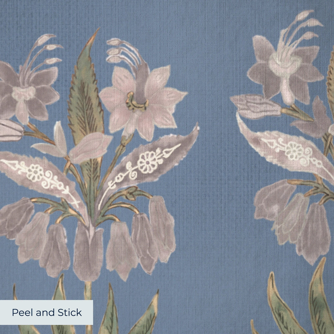 Pink 17th century Indian chintz sprigs on a muted blue ground: peel-and-stick wallpaper closeup, linen-like texture