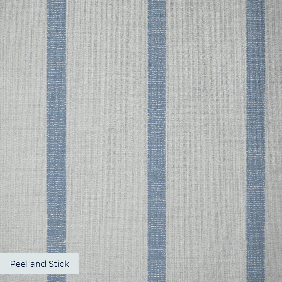 Muted blue woven-texture pencil stripe on a grey ground: peel-and-stick wallpaper closeup, linen-like texture