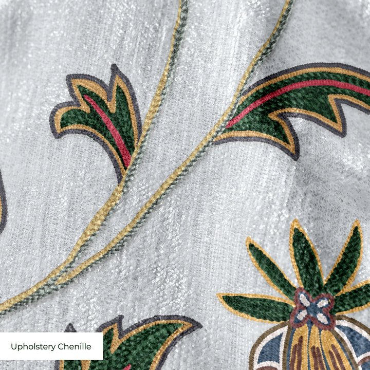Navy floral vines on a grey ground upholstery chenille swatch close-up.