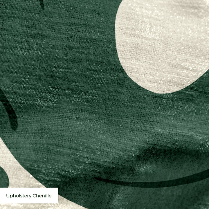 Large green acanthus scroll motif on a beige ground: upholstery chenille swatch close-up.