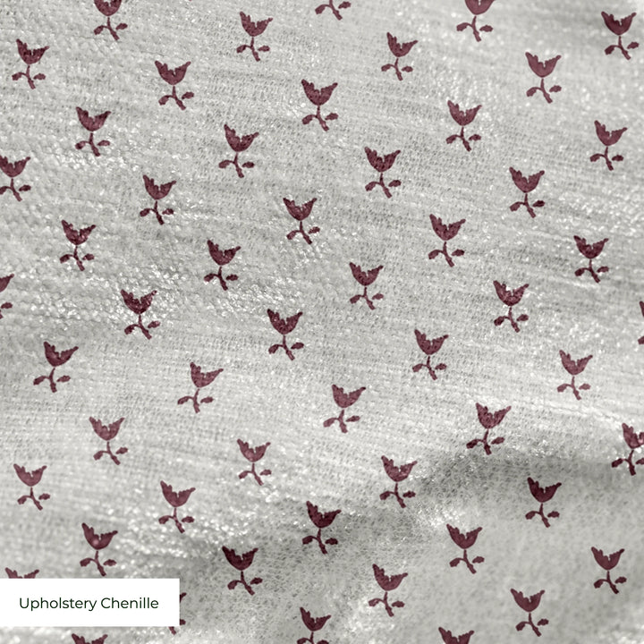 Deep red-brown Second Empire tulip silhouette on a pale grey ground: upholstery chenille swatch close-up.