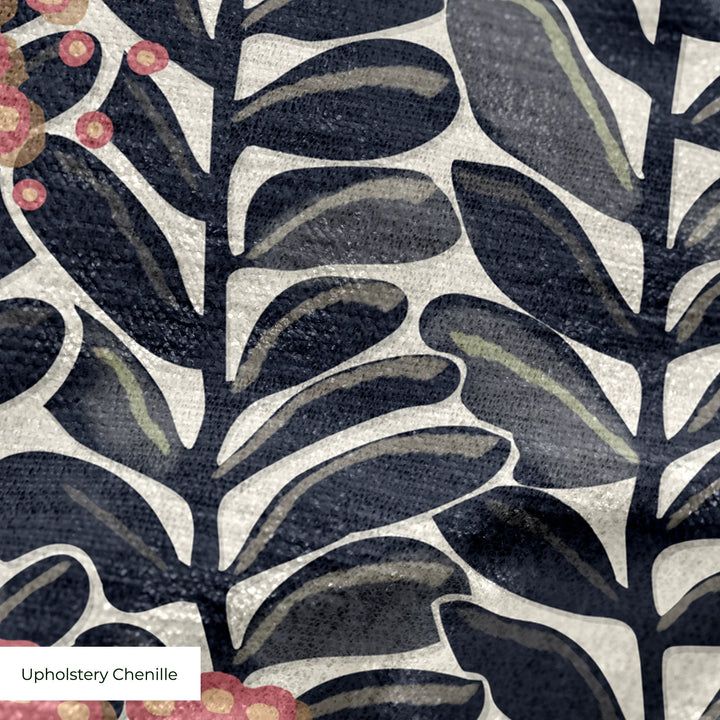 Navy 1918 leaf sprays with red berries on a beige ground: upholstery chenille swatch close-up.
