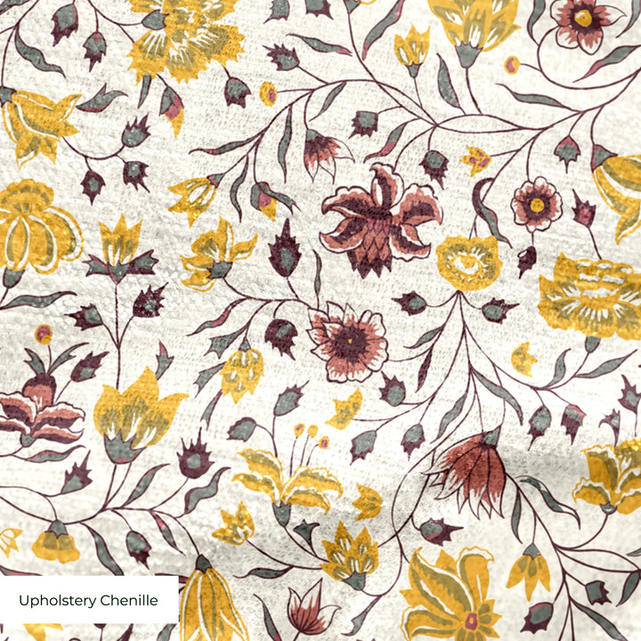 Yellow 18th century Indian chintz vine on a white ground: upholstery chenille swatch close-up.