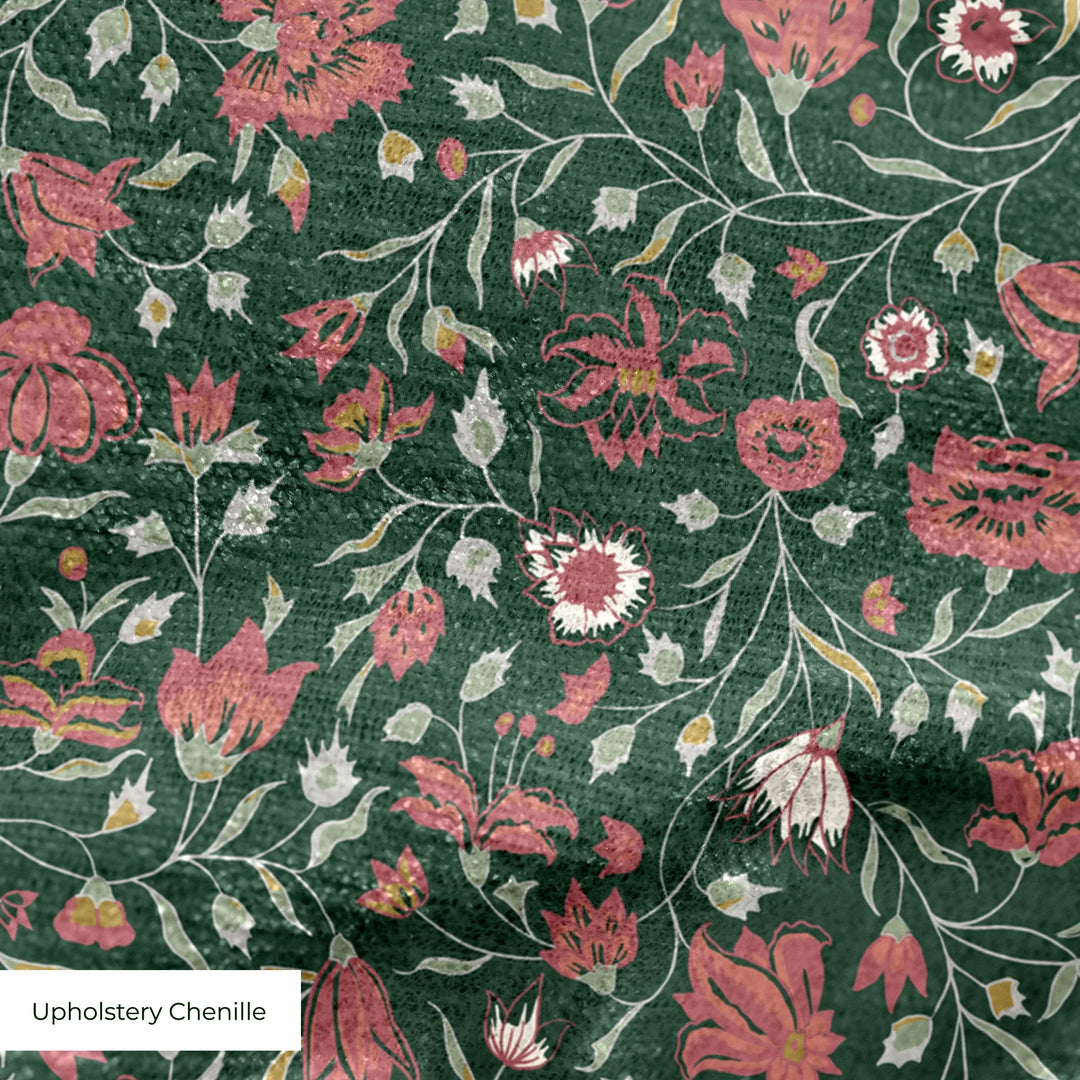 Red 18th century Indian chintz vine on a dark green ground: upholstery chenille swatch close-up.