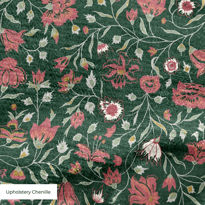 Red 18th century Indian chintz vine on a dark green ground: upholstery chenille swatch close-up.