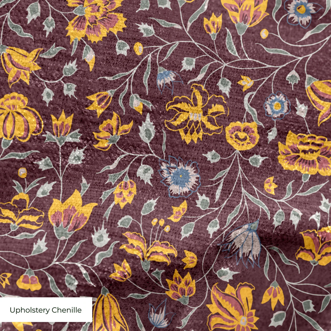 Yellow 18th century Indian chintz vine on a dark purple ground: upholstery chenille swatch close-up.