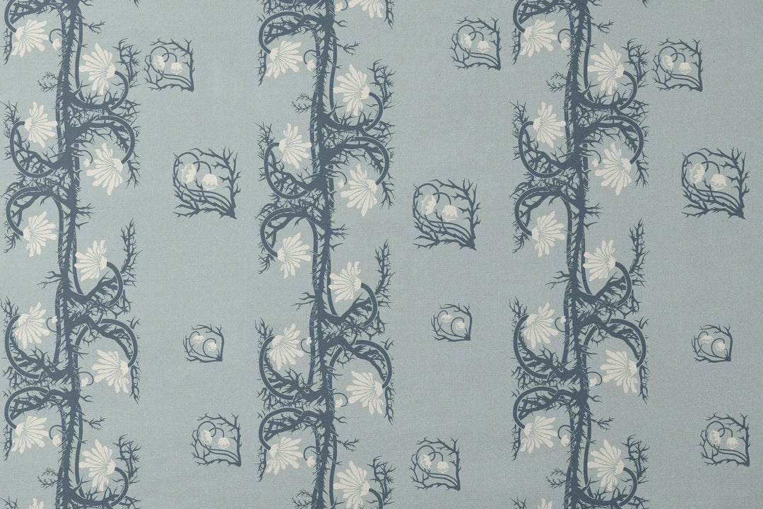 Marguerite in mist and slate: spined, entwined stems forming vertical channels around massed daisy heads, translated from a c. 1904 Dutch linen damask finger towel by Cornelis van der Sluys. designs flat mockup