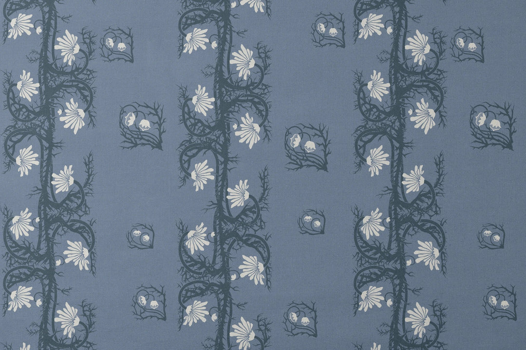 Marguerite in dusty blue and slate: spined, entwined stems forming vertical channels around massed daisy heads, translated from a c. 1904 Dutch linen damask finger towel by Cornelis van der Sluys. designs flat mockup